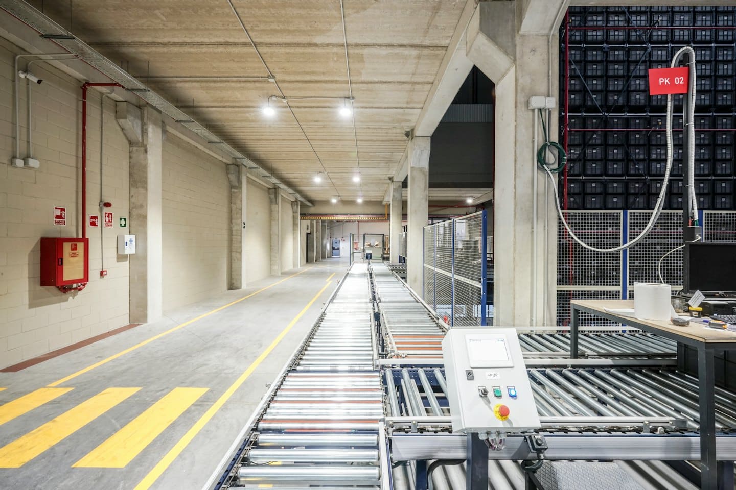 Automated conveyor system in a modern industrial storage facility.
